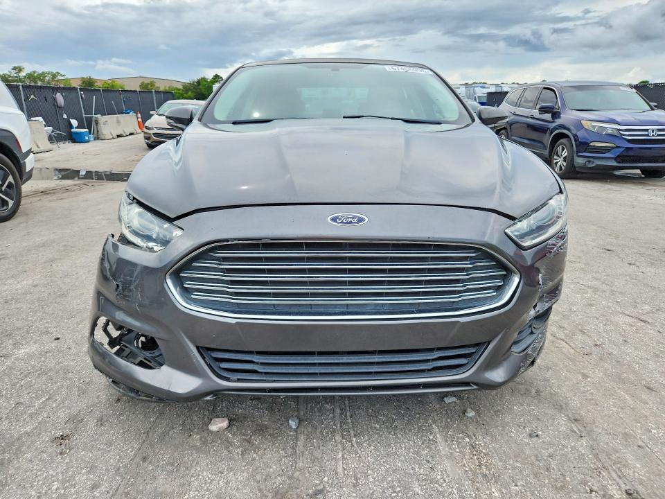 Photo 5 from auction – 2016 FORD FUSION with VIN 3FA6P0H74GR323331