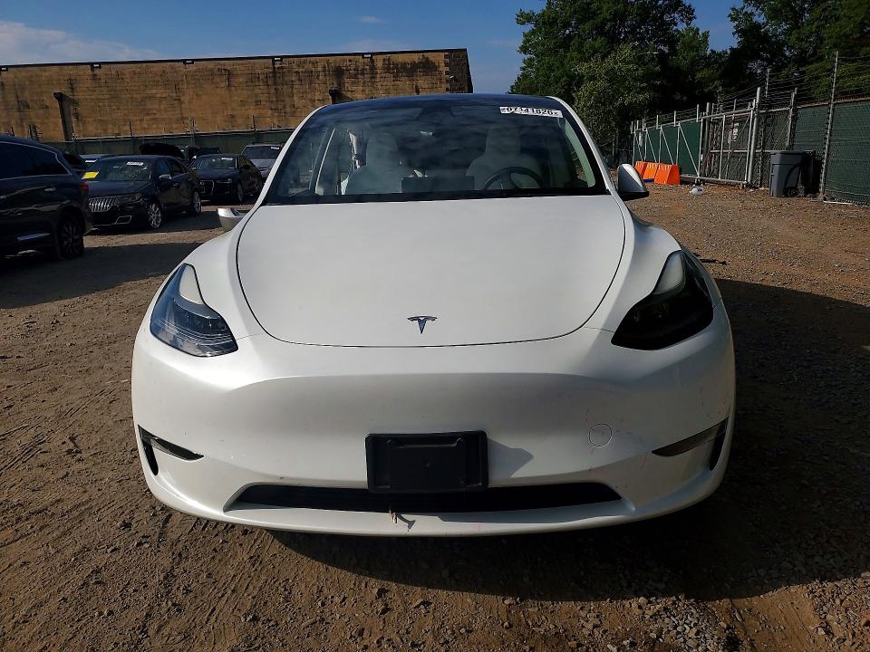 Снимка 5 от търг – 2023 TESLA MODEL Y с VIN 7SAYGDEE5PF639466