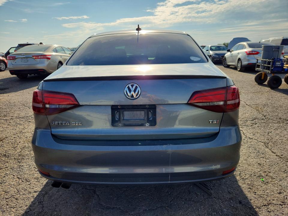 Снимка 6 от търг – 2016 VOLKSWAGEN JETTA с VIN 3VWL17AJ2GM390971
