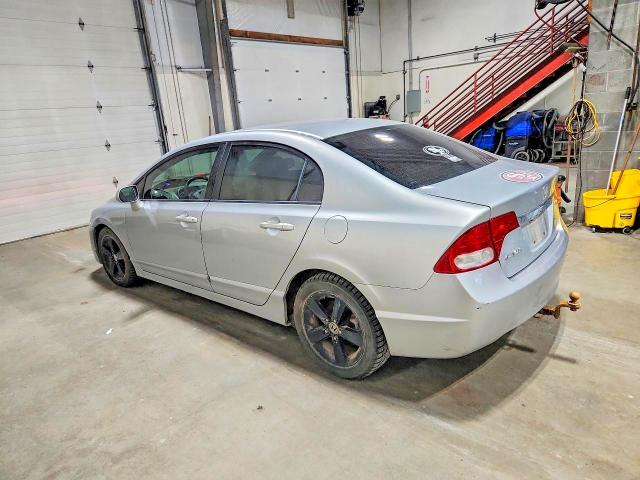Photo 2 from auction – 2011 HONDA CIVIC with VIN 2HGFA1F90BH52285X