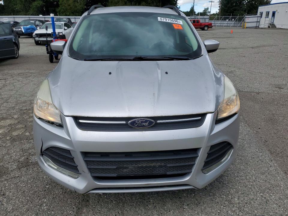 Photo 5 from auction – 2014 FORD ESCAPE with VIN 1FMCU0GX8EUD28038