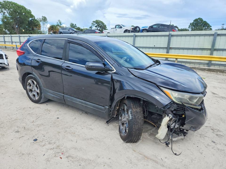 Photo 4 from auction – 2017 HONDA CR-V with VIN 7FARW1H83HE010366