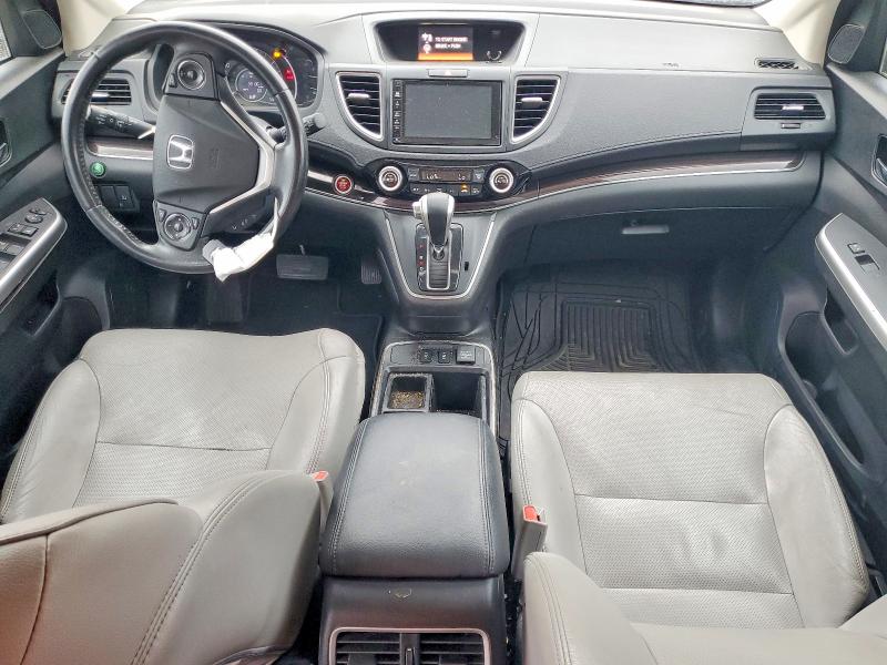Photo 8 from auction – 2016 HONDA CR-V with VIN 2HKRM4H72GH630121