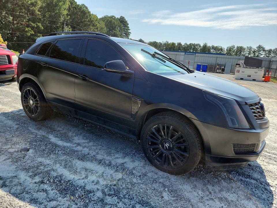 Снимка 4 от търг – 2016 CADILLAC SRX с VIN 3GYFNBE37GS504147