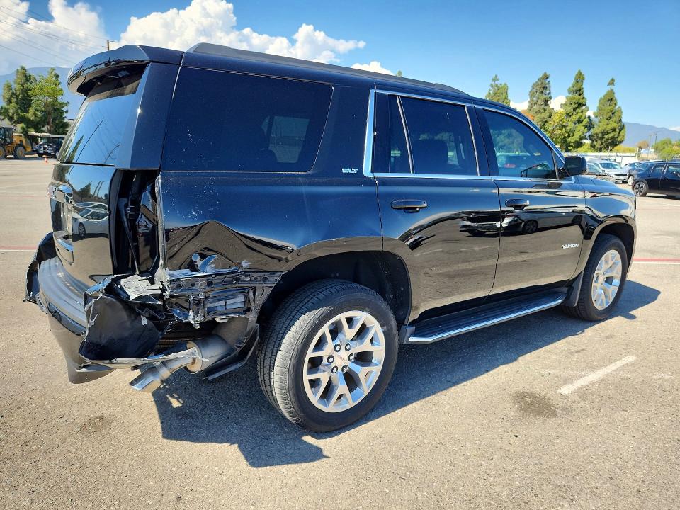 Photo 3 from auction – 2019 GMC YUKON with VIN 1GKS1DKCXKR405774