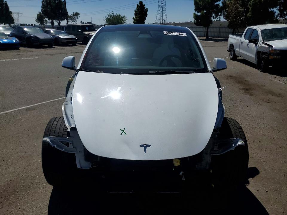 Photo 5 from auction – 2023 TESLA MODEL Y with VIN 7SAYGDEE8PF589081