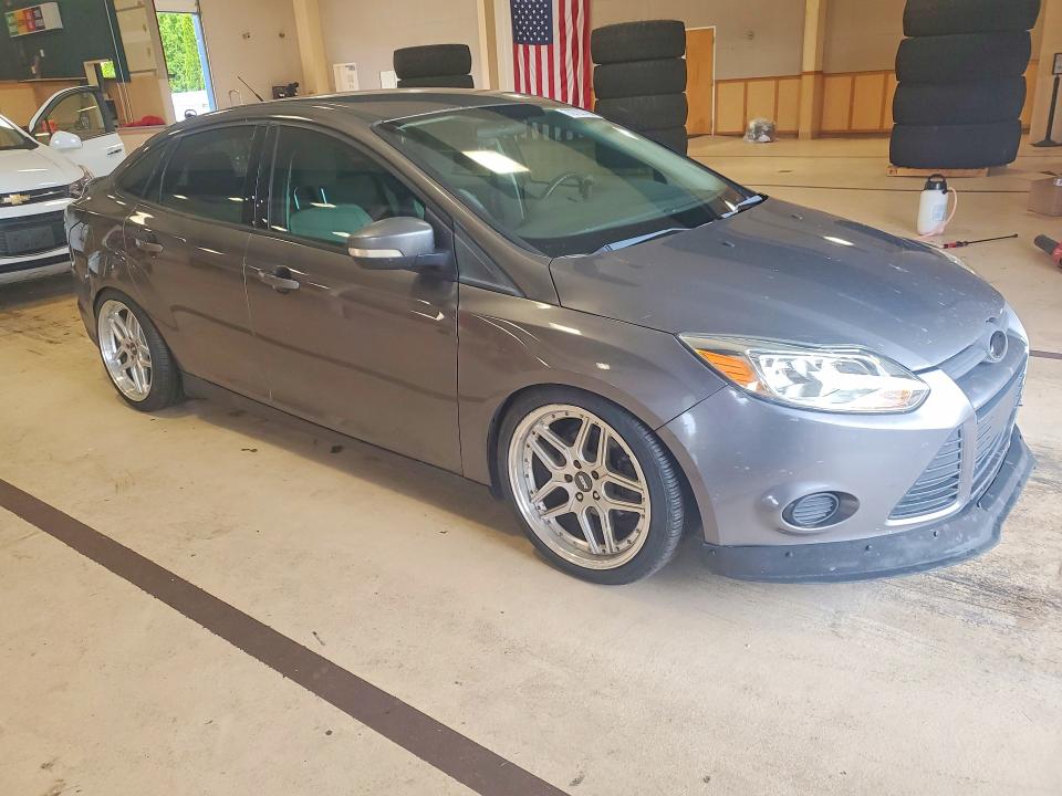 Photo 4 from auction – 2012 FORD FOCUS with VIN 1FAHP3F21CL341859
