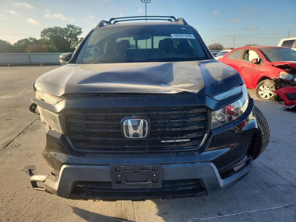 Photo 5 from auction – 2021 HONDA RIDGELINE with VIN 5FPYK3F81MB005864