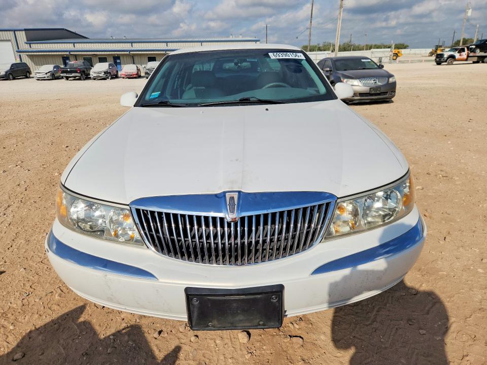 Photo 5 from auction – 1998 LINCOLN CONTINENTAL with VIN 1LNFM97V3WY640553