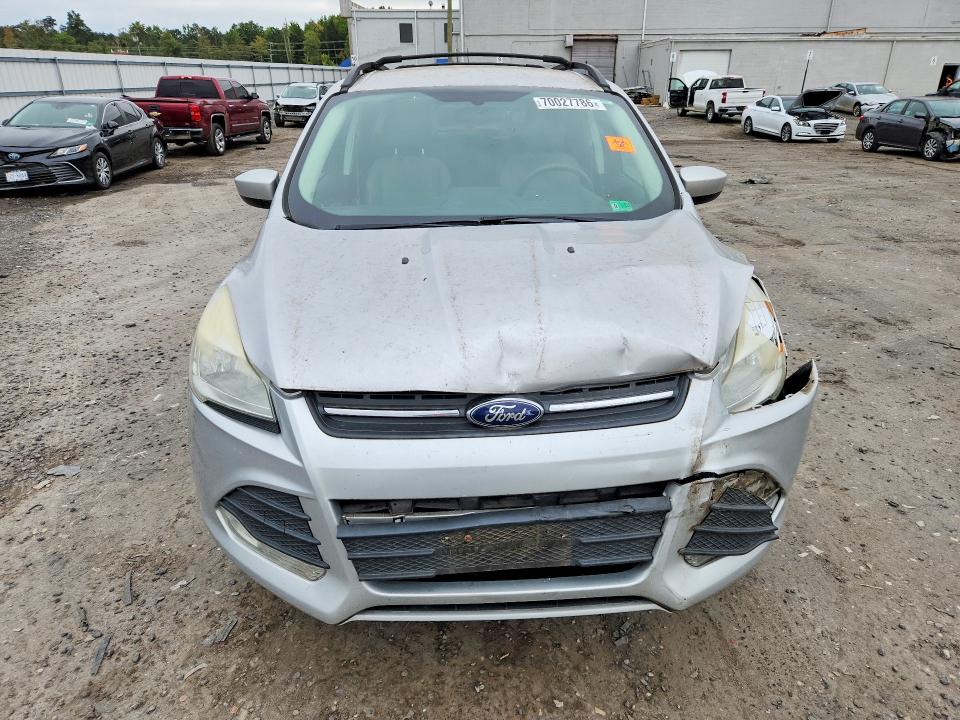 Photo 5 from auction – 2016 FORD ESCAPE with VIN 1FMCU9G92GUC52356