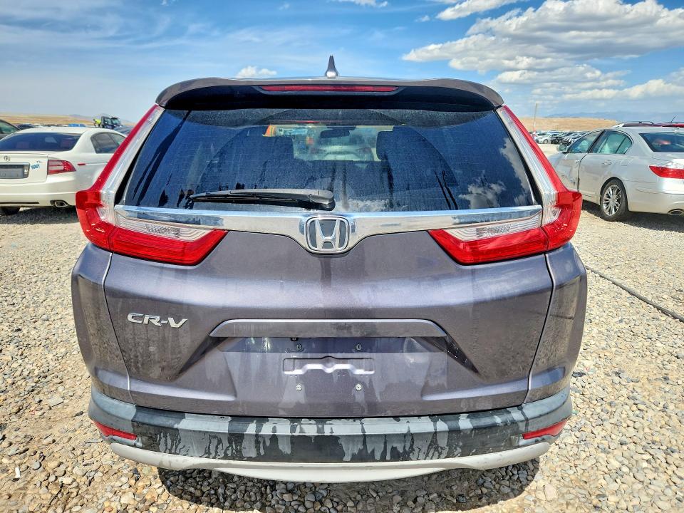 Photo 6 from auction – 2017 HONDA CR-V with VIN 7FARW1H51HE024241
