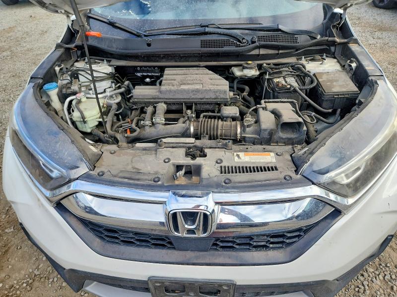 Photo 12 from auction – 2019 HONDA CR-V with VIN 7FARW1H83KE037865
