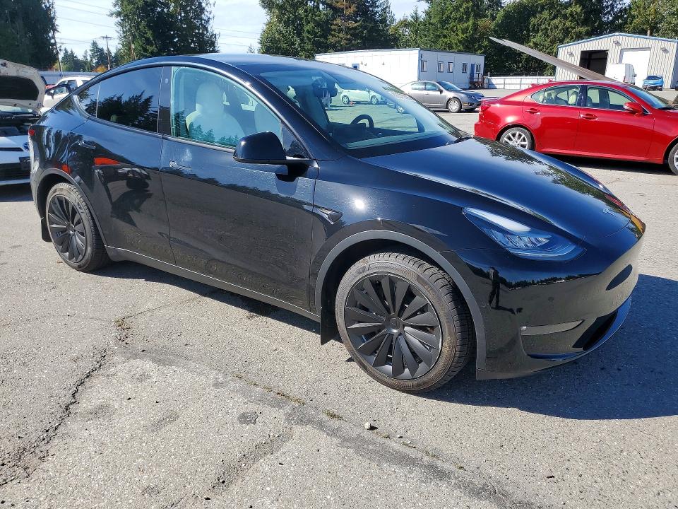 Photo 4 from auction – 2021 TESLA MODEL Y with VIN 5YJYGDED1MF116297