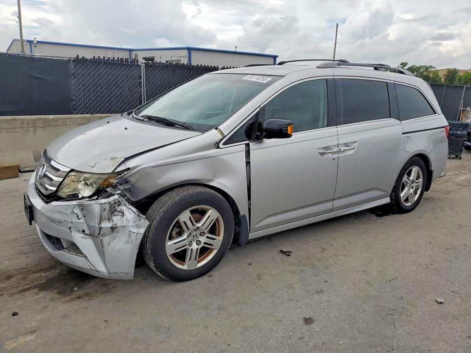 HONDA ODYSSEY 2011 with VIN 5FNRL5H91BB093128 - Photo from auction