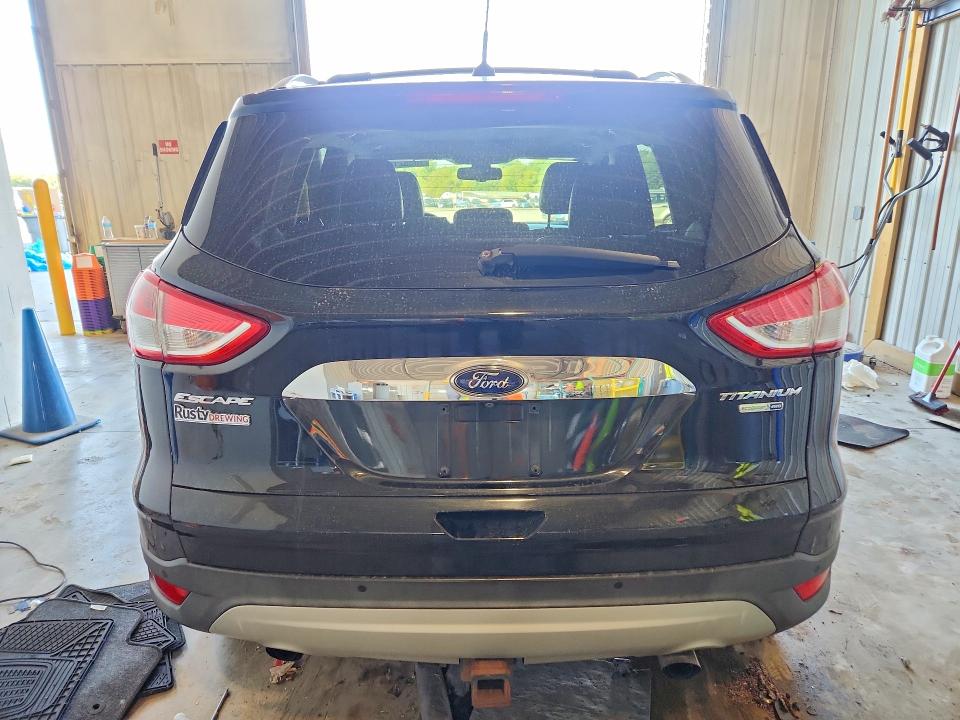 Снимка 6 от търг – 2014 FORD ESCAPE с VIN 1FMCU9J90EUA29710