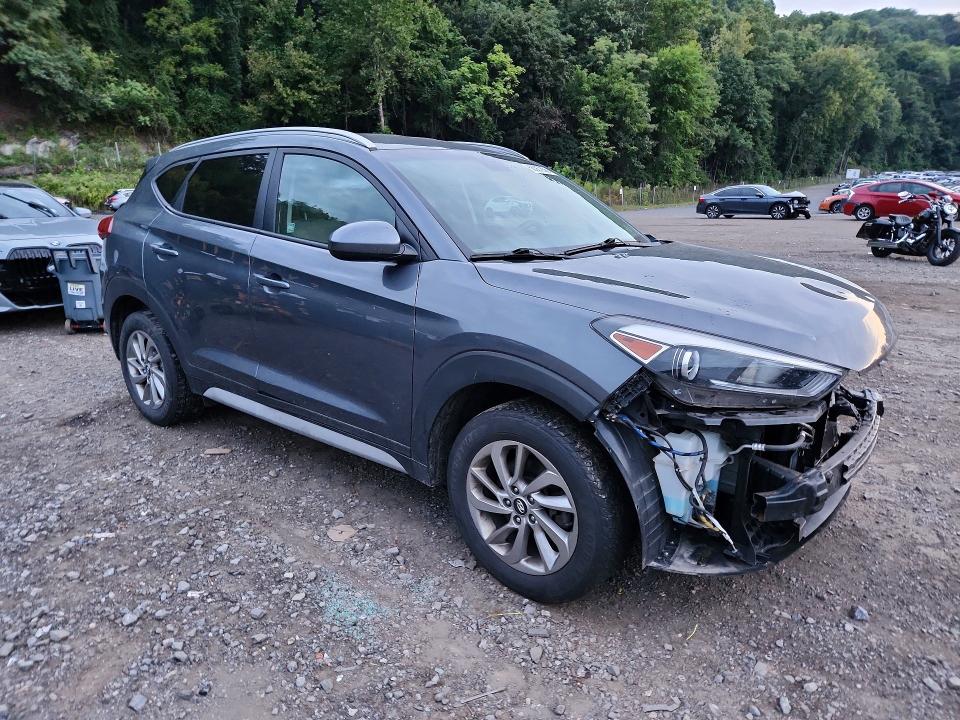 Photo 4 from auction – 2017 HYUNDAI TUCSON with VIN KM8J3CA46HU509704