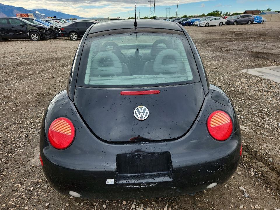 Снимка 6 от търг – 2000 VOLKSWAGEN NEW BEETLE с VIN 3VWDD21C5YM493111