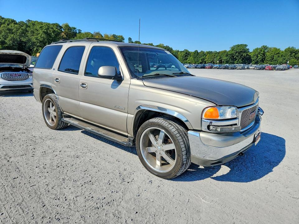 Photo 4 from auction – 2002 GMC YUKON with VIN 1GKEC13Z32R303340