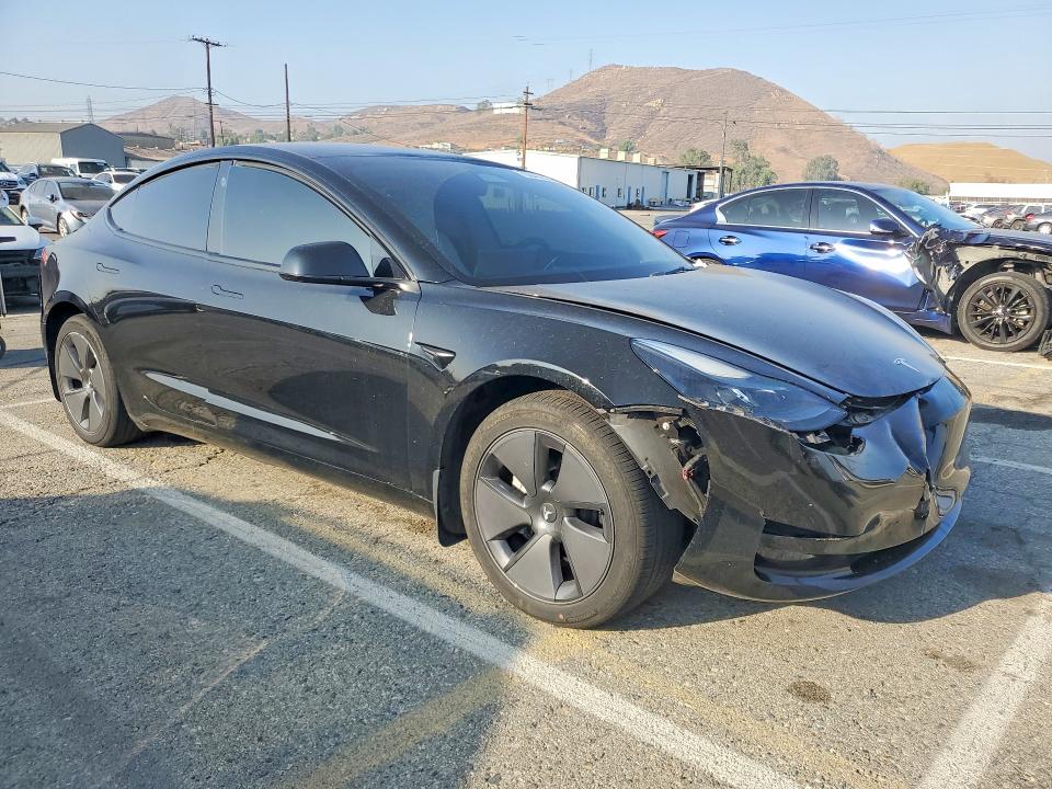 Снимка 4 от търг – 2023 TESLA MODEL 3 с VIN 5YJ3E1EB2PF632458
