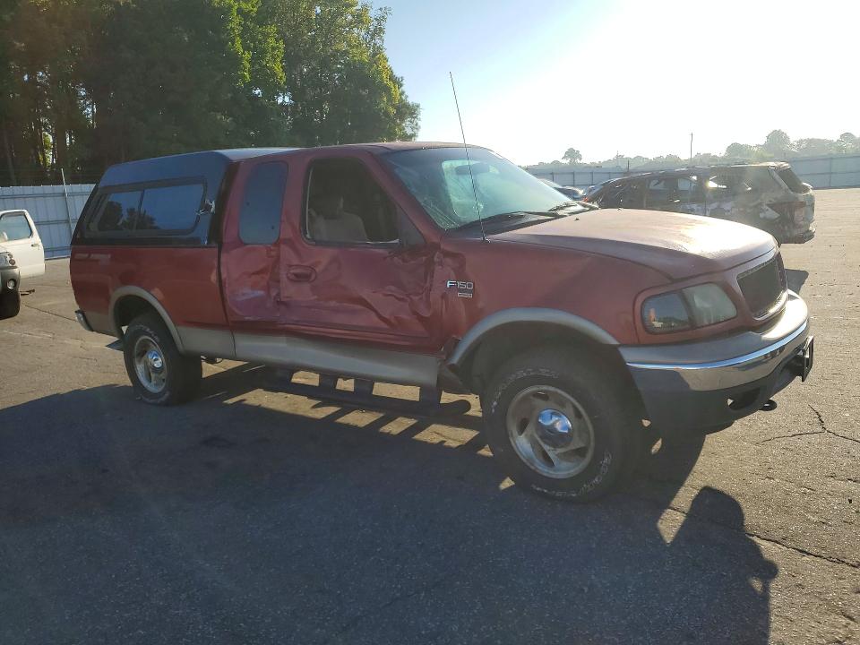 Photo 4 from auction – 2001 FORD F150 with VIN 1FTRX18W41NB99401