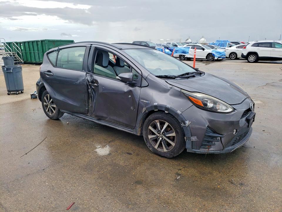 Photo 4 from auction – 2018 TOYOTA PRIUS C with VIN JTDKDTB37J1612469