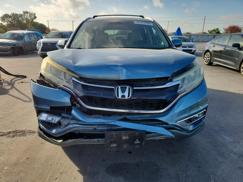 Photo 5 from auction – 2016 HONDA CR-V with VIN 2HKRM4H79GH668008