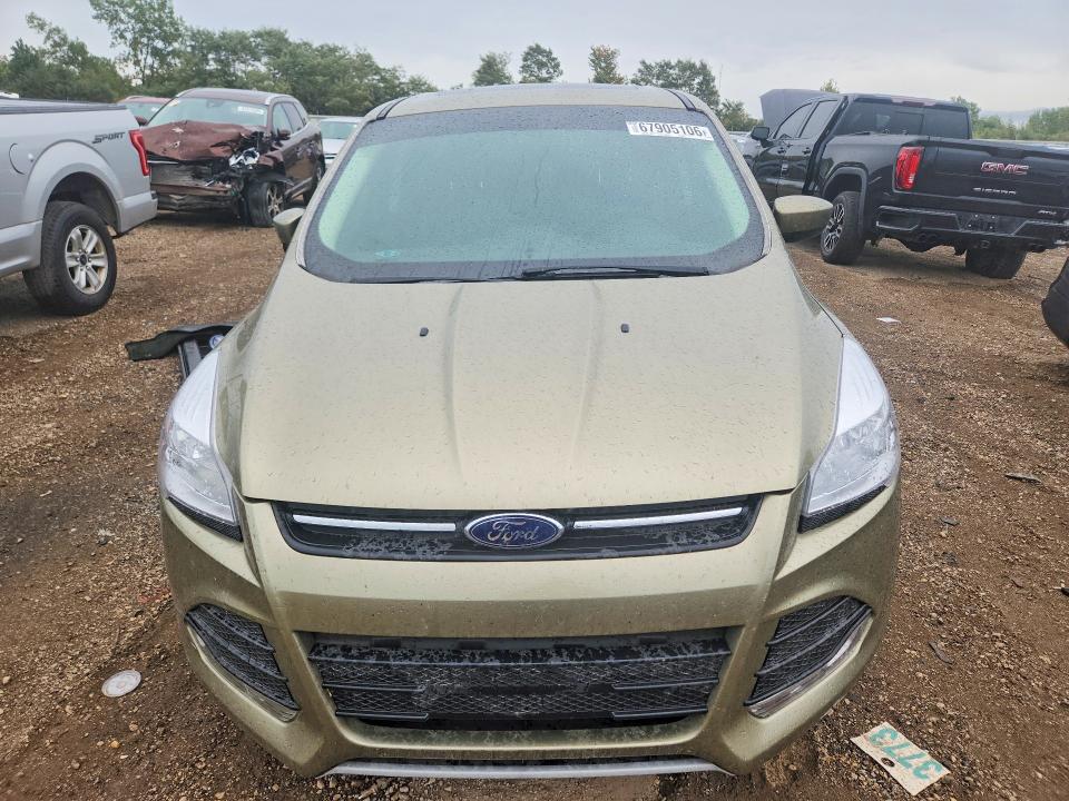 Photo 5 from auction – 2014 FORD ESCAPE with VIN 1FMCU0GXXEUB24342
