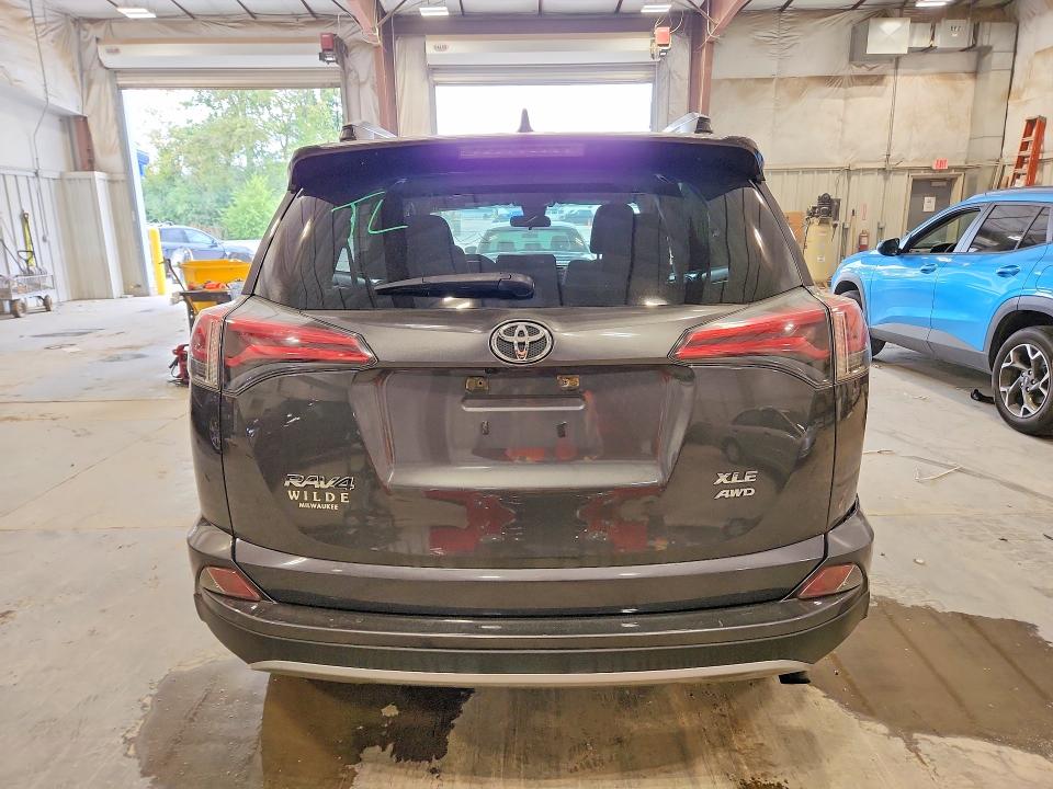 Photo 6 from auction – 2017 TOYOTA RAV4 with VIN JTMRFREV7HJ117479