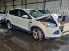 Photo 4 from auction – 2016 FORD ESCAPE with VIN 1FMCU9J95GUC59357