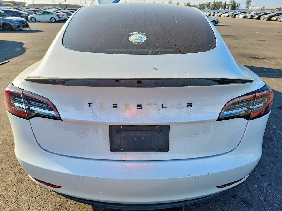 Снимка 6 от търг – 2021 TESLA MODEL 3 с VIN 5YJ3E1EA6MF873202