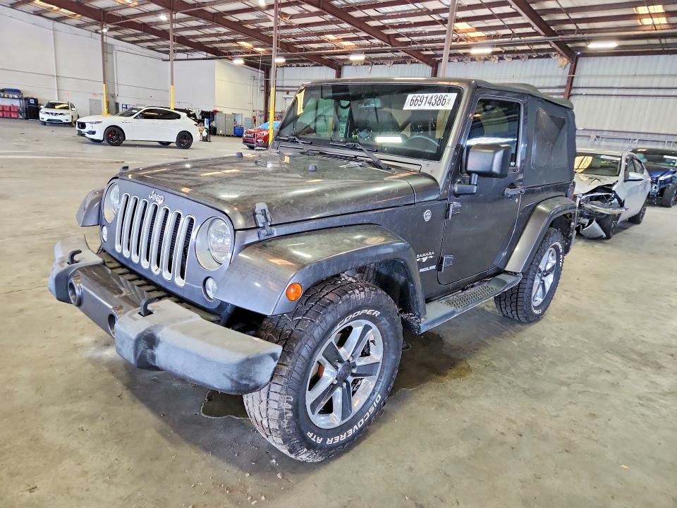 JEEP WRANGLER 2016 مع رقم تعريف المركبة 1C4AJWBG0GL167580 - صورة من المزاد