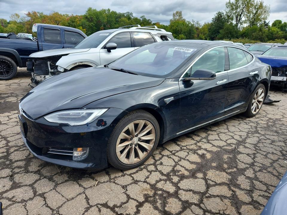 TESLA MODEL S 2016 with VIN 5YJSA1E2XGF143930 - Photo from auction