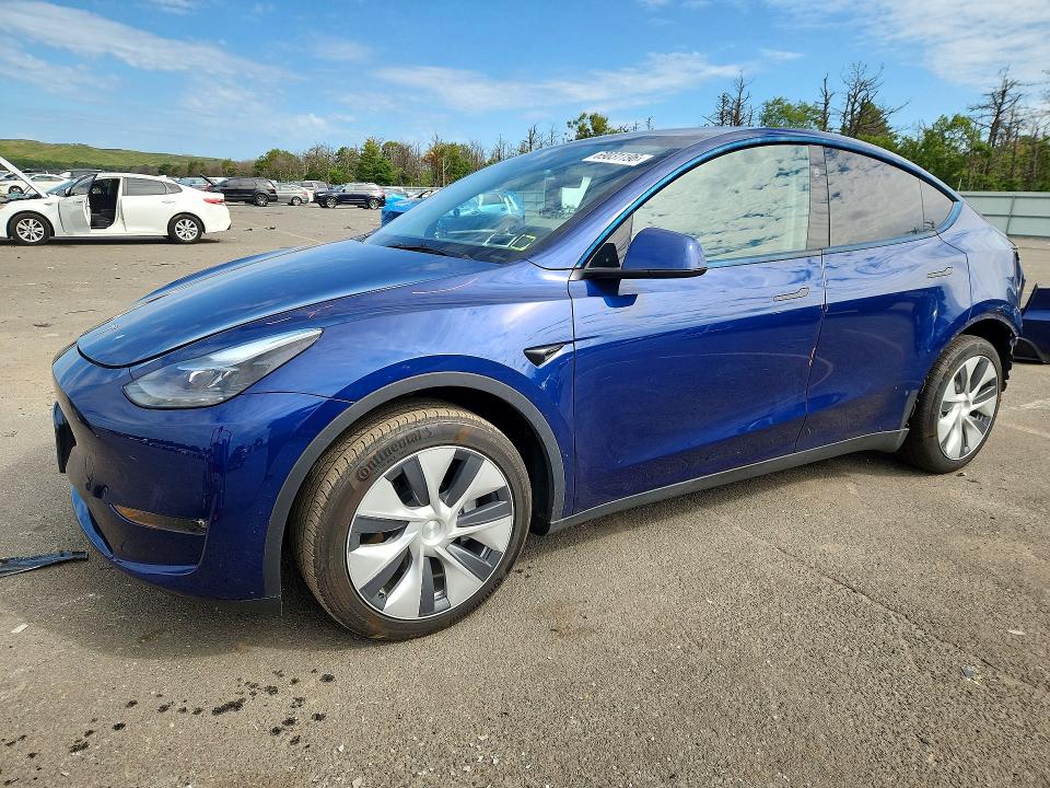 TESLA MODEL Y 2023 с VIN 7SAYGAEE0PF977808 - Снимка от търг