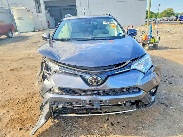 Photo 5 from auction – 2018 TOYOTA RAV4 with VIN JTMRFREV2JJ196842