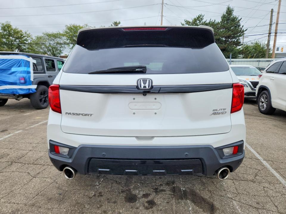 Photo 6 from auction – 2022 HONDA PASSPORT with VIN 5FNYF8H07NB005130