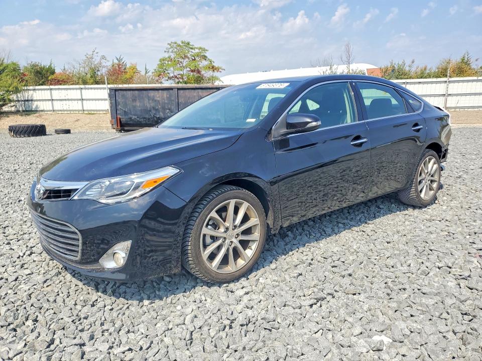 TOYOTA AVALON 2014 with VIN 4T1BK1EB7EU136009 - Photo from auction