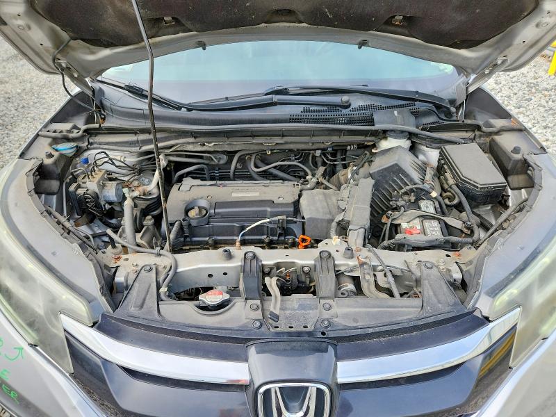 Photo 12 from auction – 2016 HONDA CR-V with VIN 5J6RM4H71GL042510