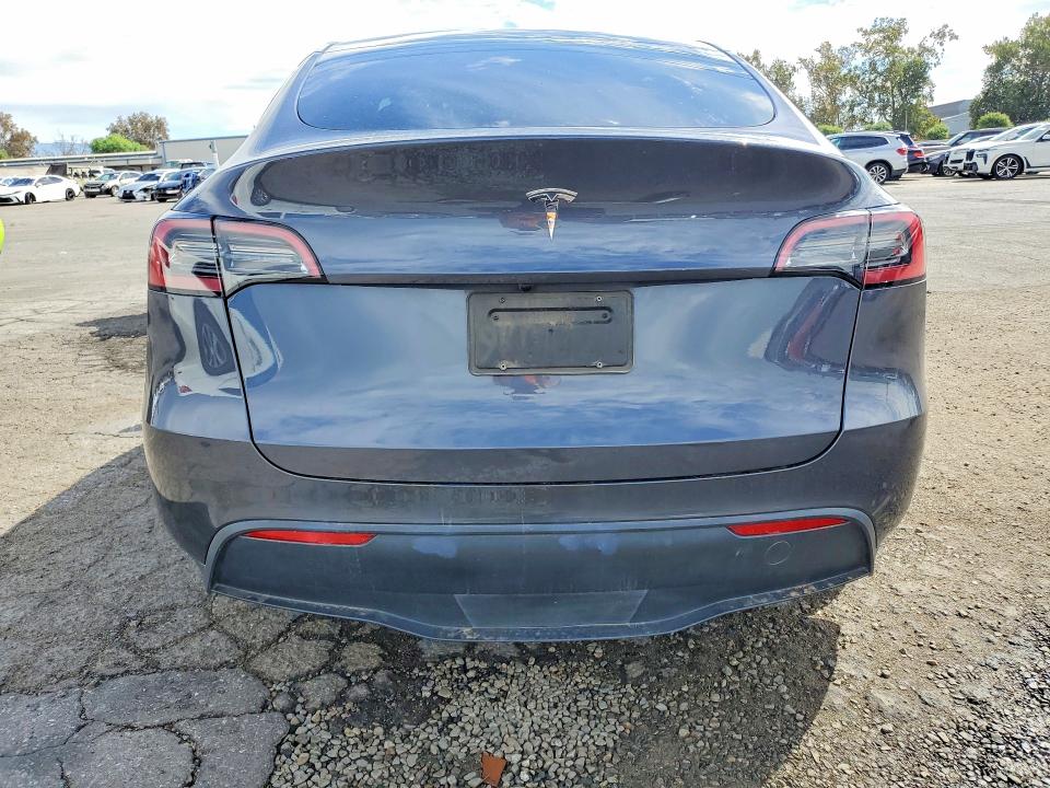 Photo 6 from auction – 2023 TESLA MODEL Y with VIN 7SAYGDED6PF960505