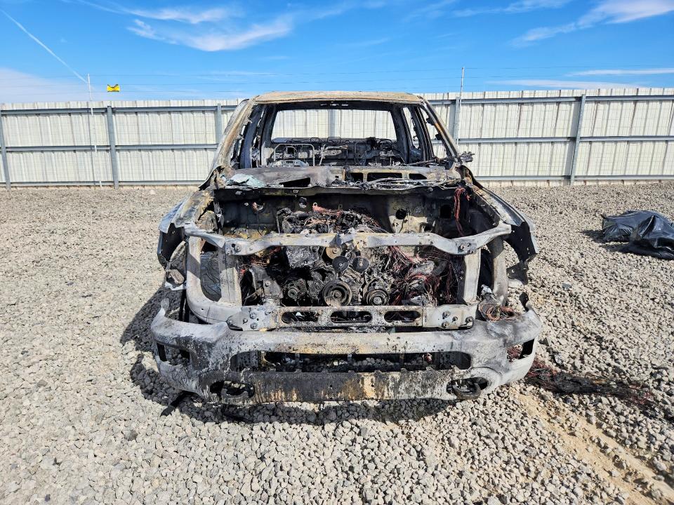 Photo 5 from auction – 2021 RAM 1500 with VIN 1C6SRFHM9MN565677