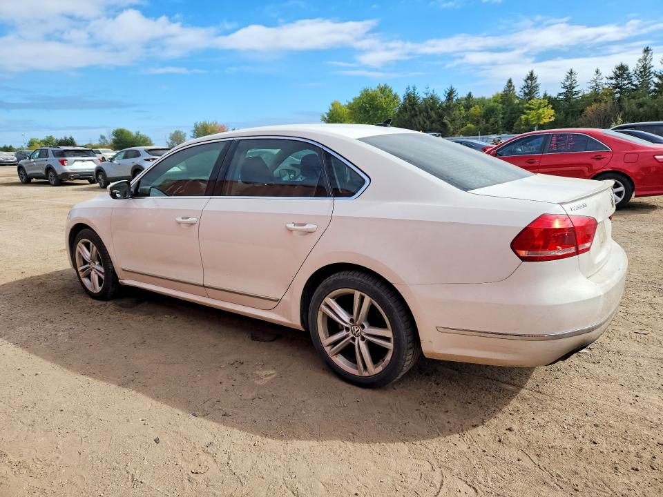 Снимка 2 от търг – 2014 VOLKSWAGEN PASSAT с VIN 1VWBN7A30EC120475