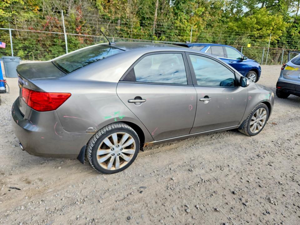 Photo 3 from auction – 2010 KIA FORTE with VIN KNAFW4A31A5049153