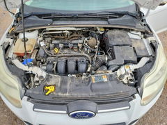 Foto 11 de la subasta – 2014 FORD FOCUS con VIN 1FADP3K2XEL461005