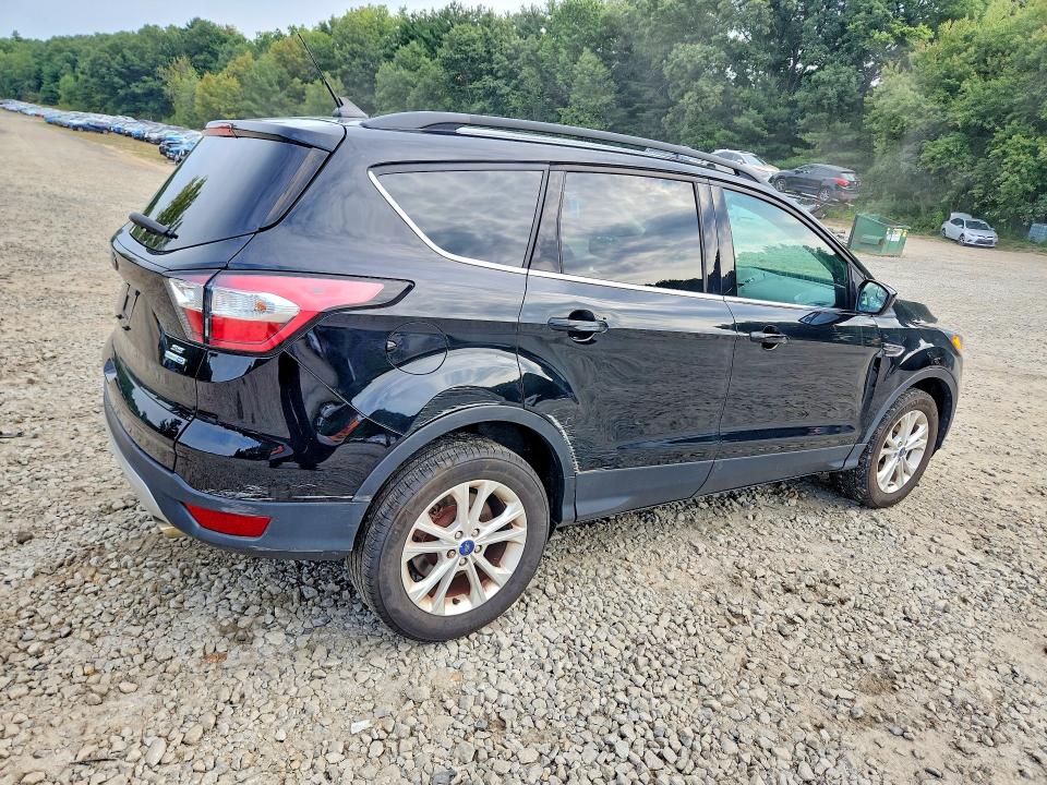 Photo 3 from auction – 2018 FORD ESCAPE with VIN 1FMCU9GD3JUC53298