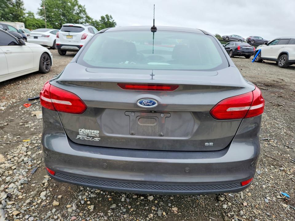 Photo 6 from auction – 2016 FORD FOCUS with VIN 1FADP3F24GL401119