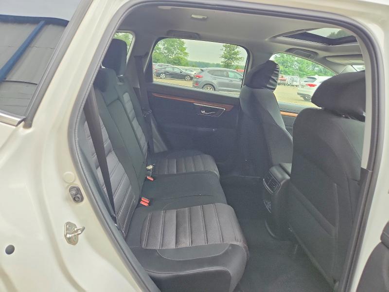 Photo 11 from auction – 2018 HONDA CR-V with VIN 2HKRW2H55JH666776