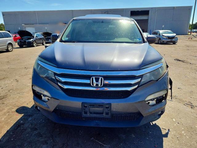 Снимка 5 от търг – 2016 HONDA PILOT с VIN 5FNYF6H5XGB073263