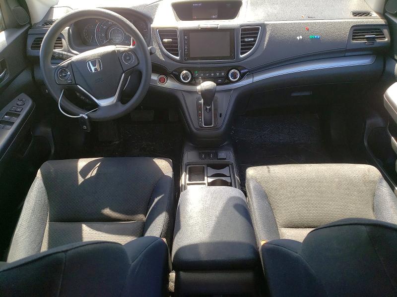 Photo 8 from auction – 2015 HONDA CR-V with VIN 3CZRM3H54FG707100