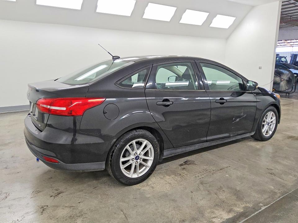 Photo 3 from auction – 2015 FORD FOCUS with VIN 1FADP3F20FL206116