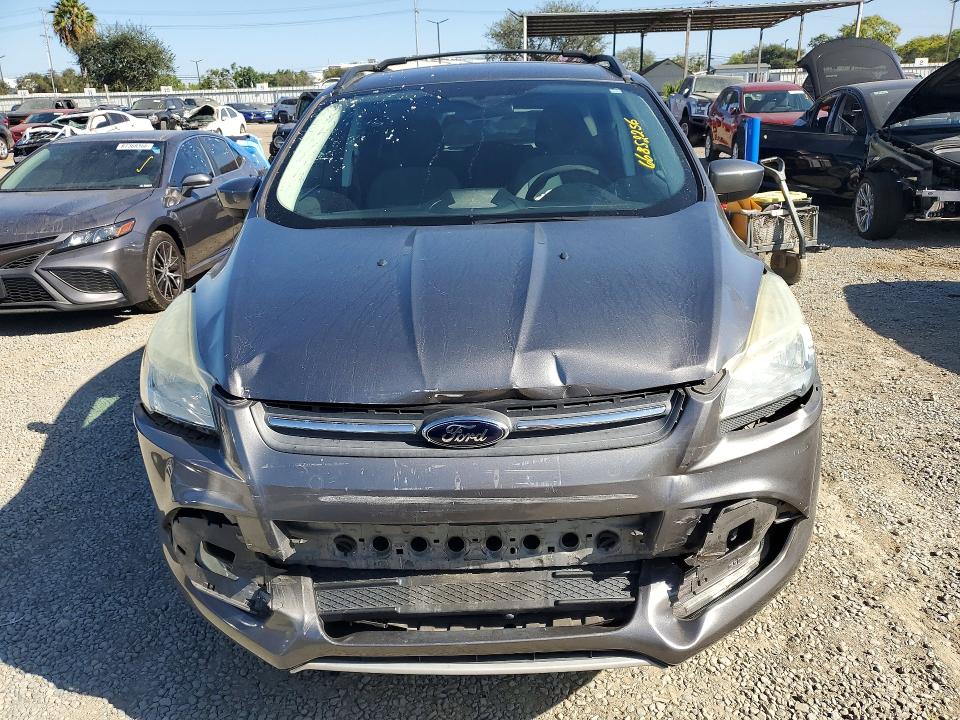 Photo 5 from auction – 2013 FORD ESCAPE with VIN 1FMCU0GX5DUC24704