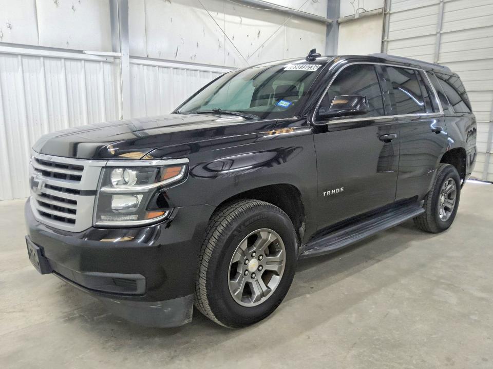 CHEVROLET TAHOE 2019 with VIN 1GNSCAKCXKR220751 - Photo from auction